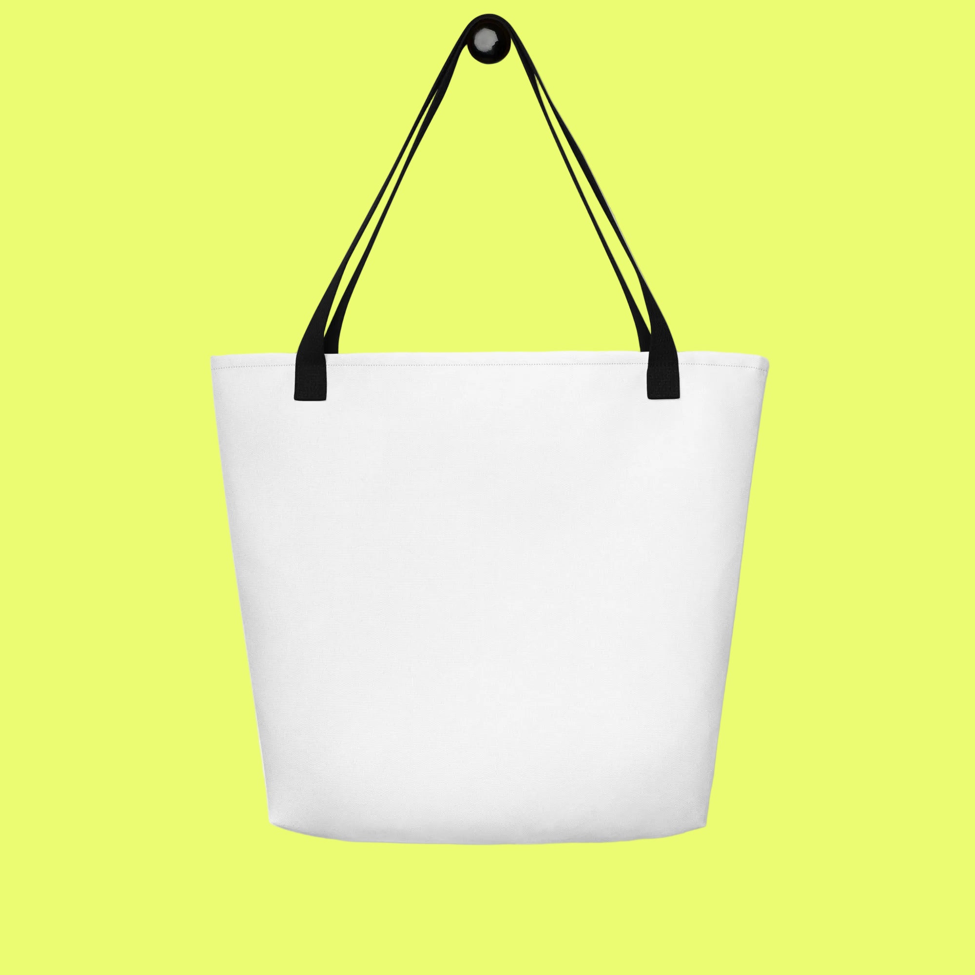 White tote bag with black handles on a white background