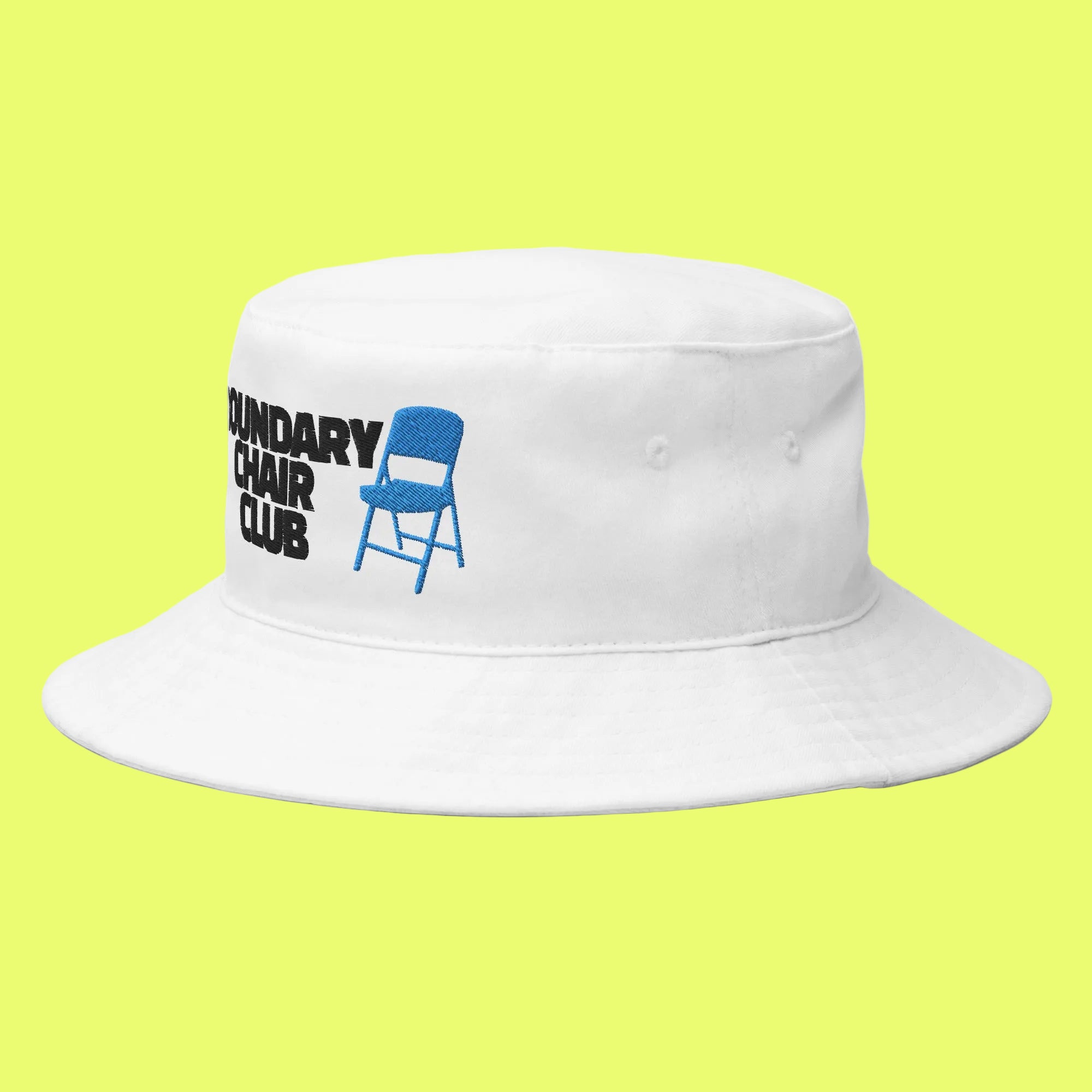 White bucket hat with 'Boundary Chair Club' text and blue chair icon on a white background
