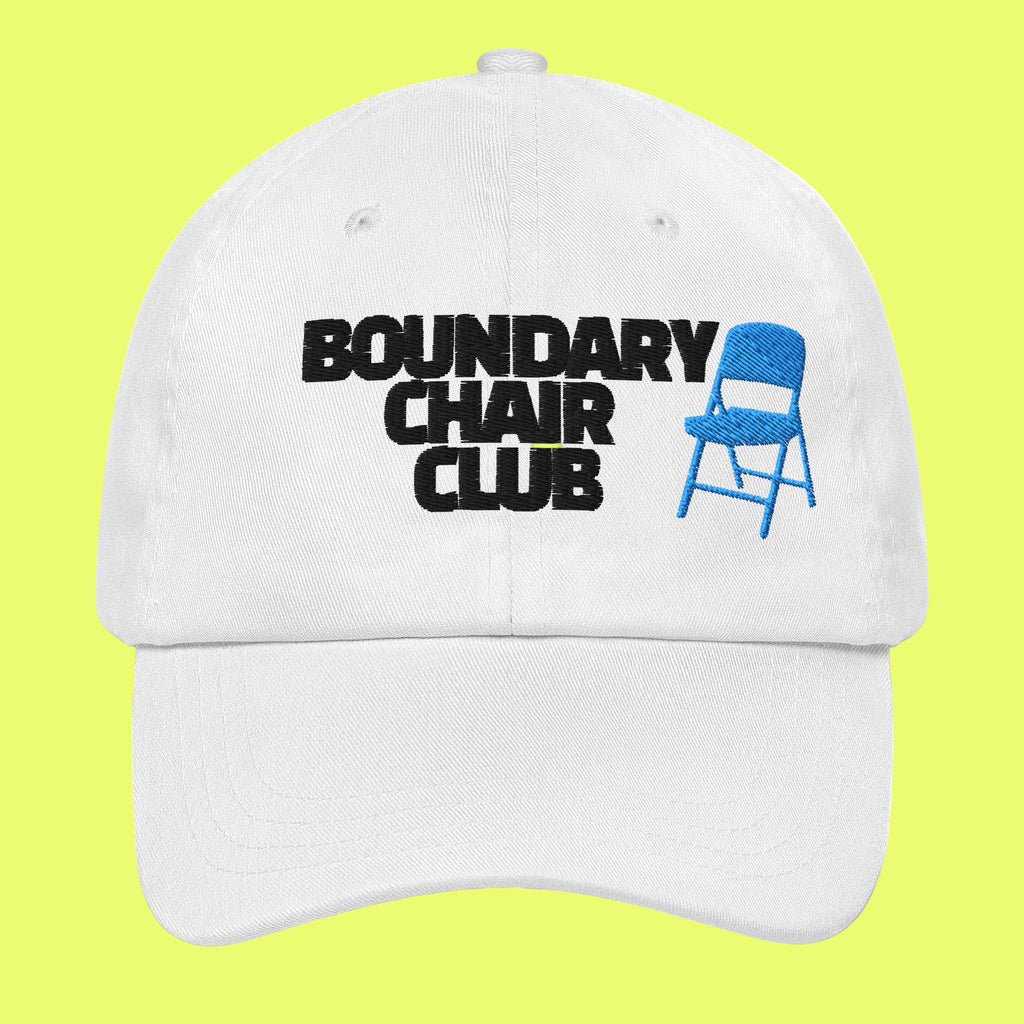 White cap with 'Boundary Chair Club' text and blue chair icon on a white background