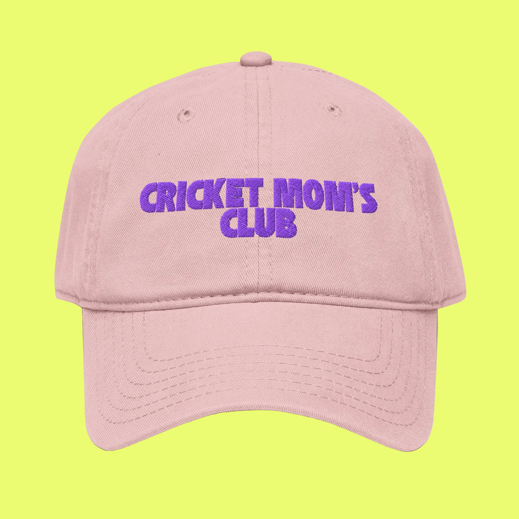 Pink cap with 'CRICKET MOM'S CLUB' text in purple on a white background
