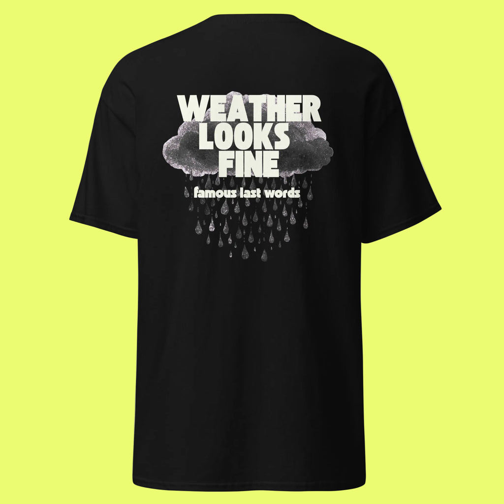 Black t-shirt with text and cloud design on the back, on a neon background
