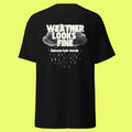Black t-shirt with text and cloud design on the back, on a neon background
