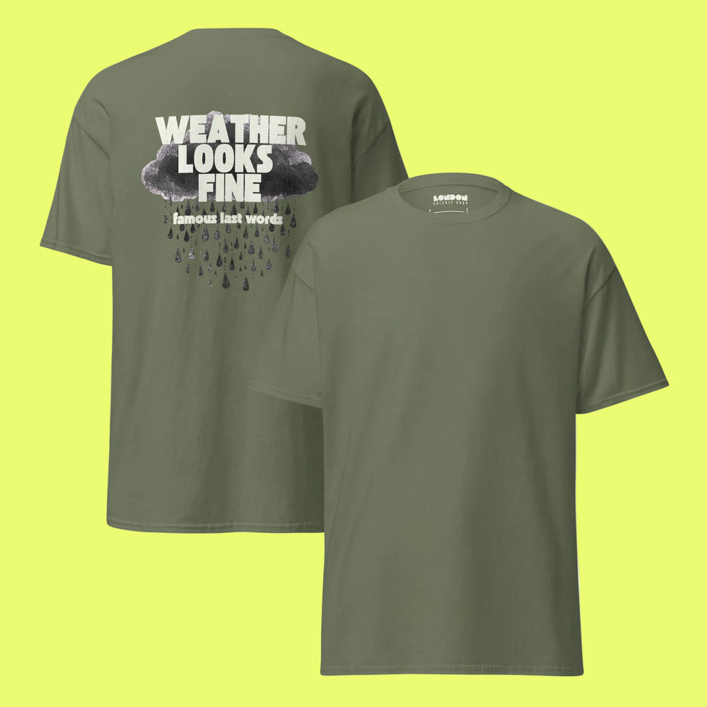 Gray t-shirt with a graphic design on the front and text on the back, displayed on a neon background.