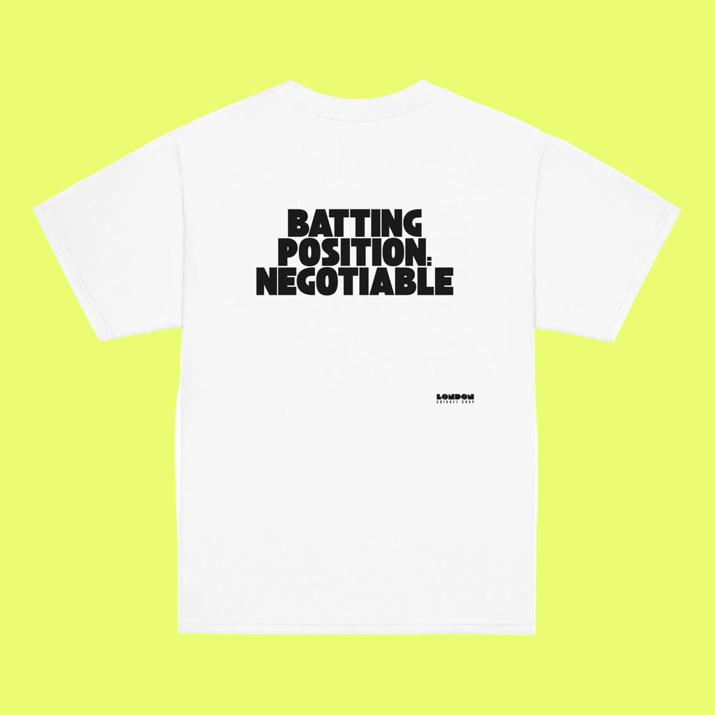 White t-shirt with black text 'BATTING POSITION NEGOTIABLE' on a white background